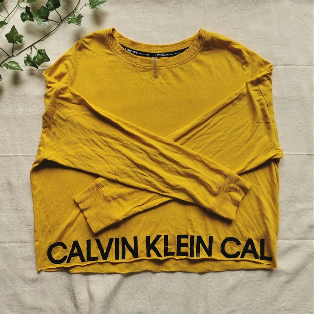 Calvin Klein yellow long-sleeve.